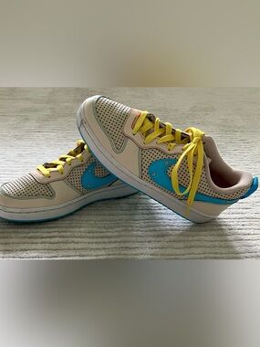 Nike Kids Cream Sneakers with Bright Blue Swoosh and Yellow Laces